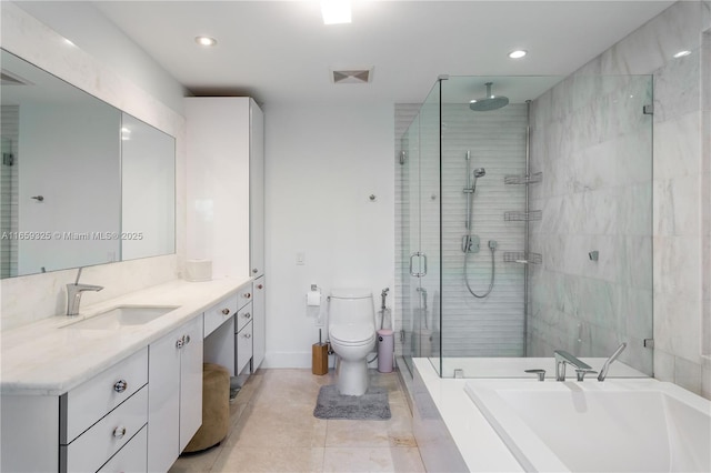 bathroom with a garden tub, toilet, visible vents, vanity, and a shower stall