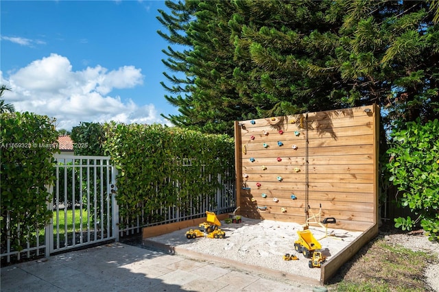 view of gate with fence