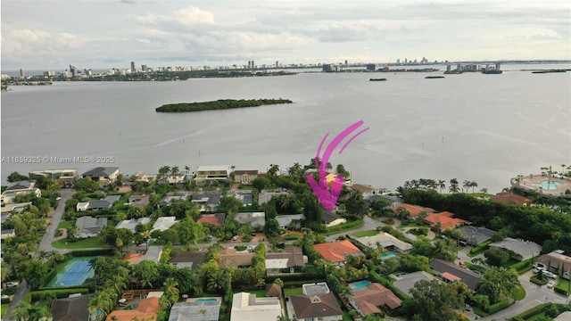 bird's eye view with a water view and a residential view