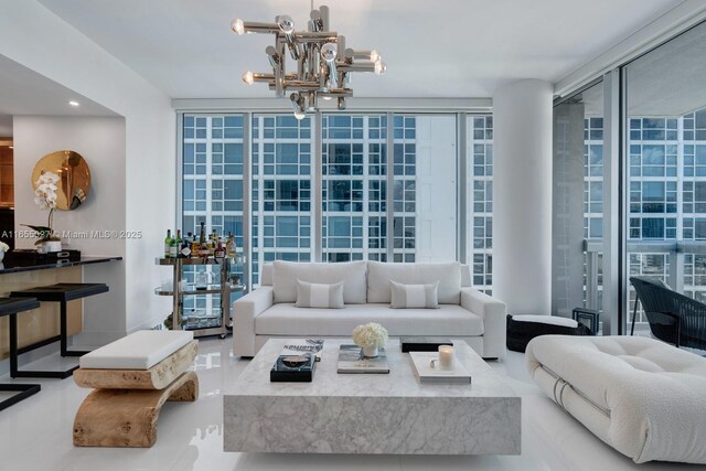 living room featuring floor to ceiling windows