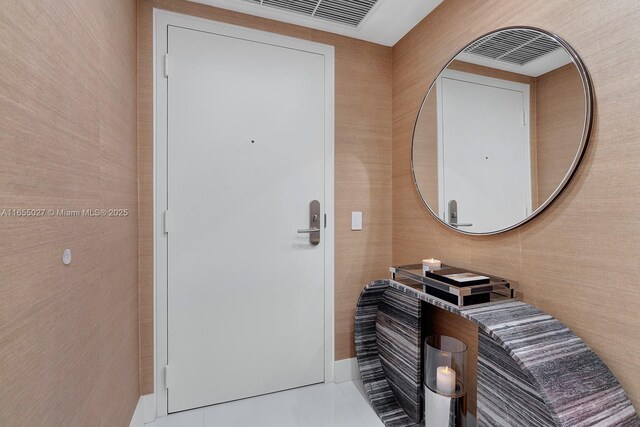 interior space featuring tile patterned flooring