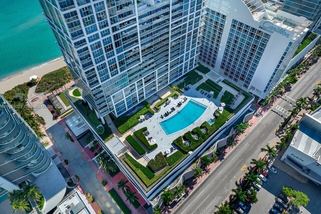 view of swimming pool with a patio area