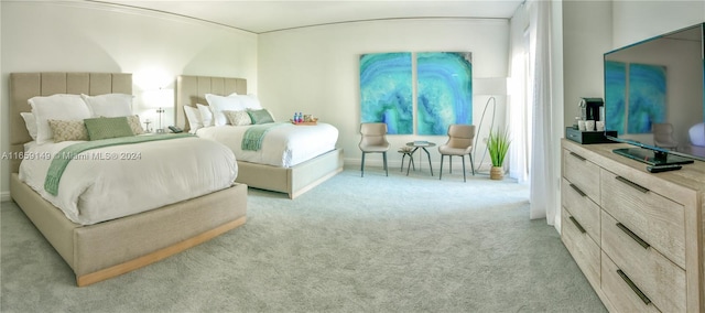 bedroom with light colored carpet