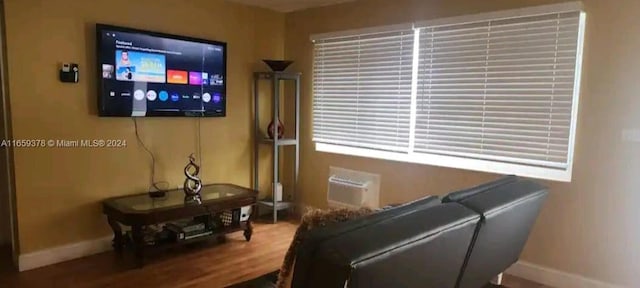 living room with hardwood / wood-style floors