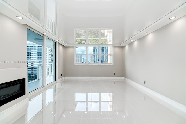 empty room with light tile patterned floors