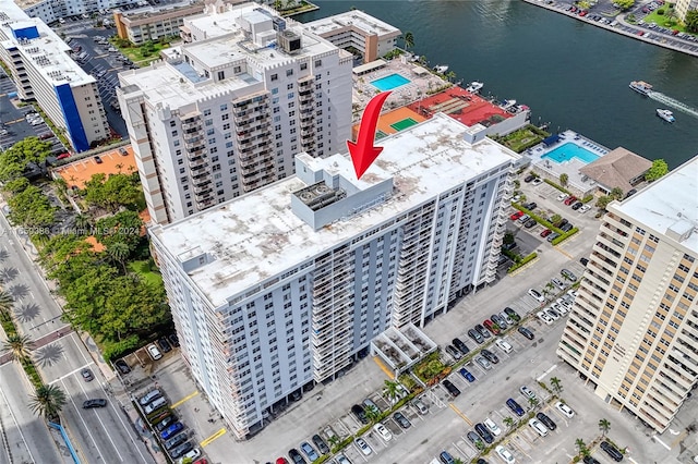 birds eye view of property featuring a water view