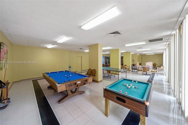 playroom featuring billiards and a textured ceiling