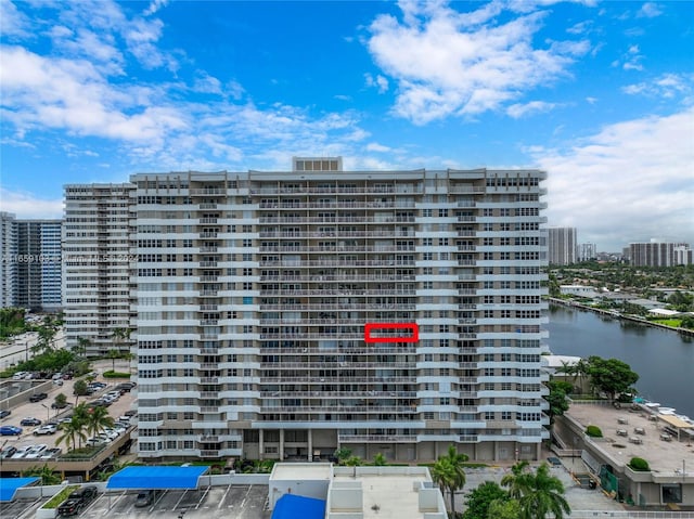 view of property with a water view