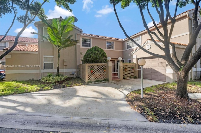 view of front of property featuring a garage