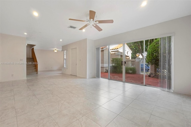 unfurnished room with ceiling fan