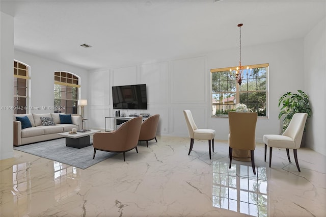 living room featuring a chandelier