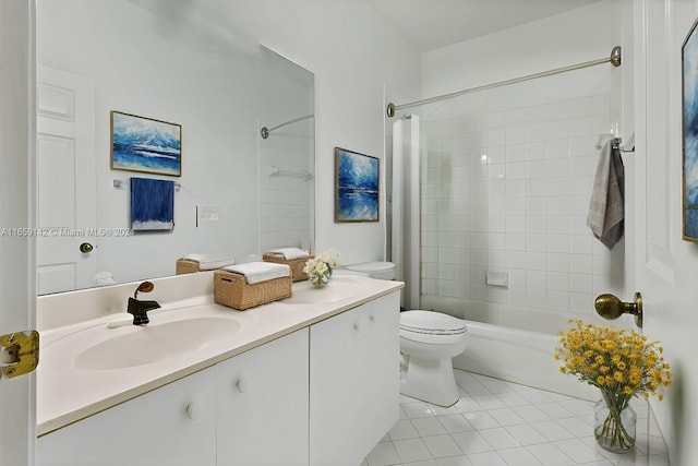 full bathroom with vanity, toilet, tile patterned floors, and tiled shower / bath