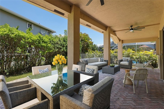 view of patio featuring ceiling fan and an outdoor hangout area