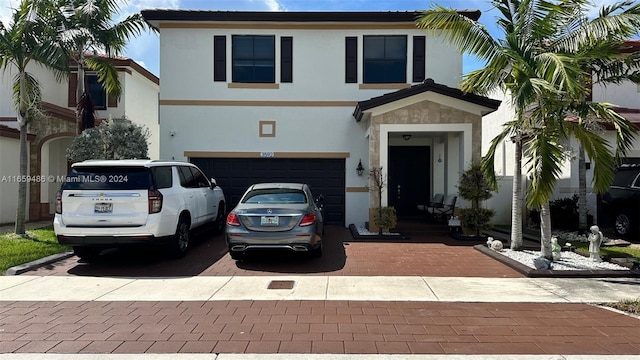 view of front of home with a garage