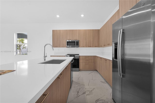 12267 SW 43rd Ct, Davie, FL 33330 - kitchen featuring stainless steel appliances, light marble finish flooring, modern cabinets, light countertops, and recessed lighting