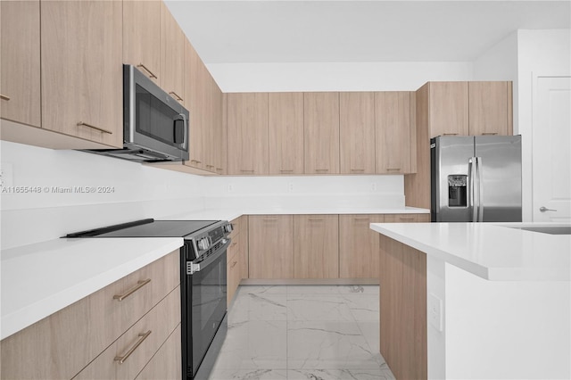 12267 SW 43rd Ct, Davie, FL 33330 - kitchen with appliances with stainless steel finishes, light brown cabinets, modern cabinets, light marble finish floors, and light countertops
