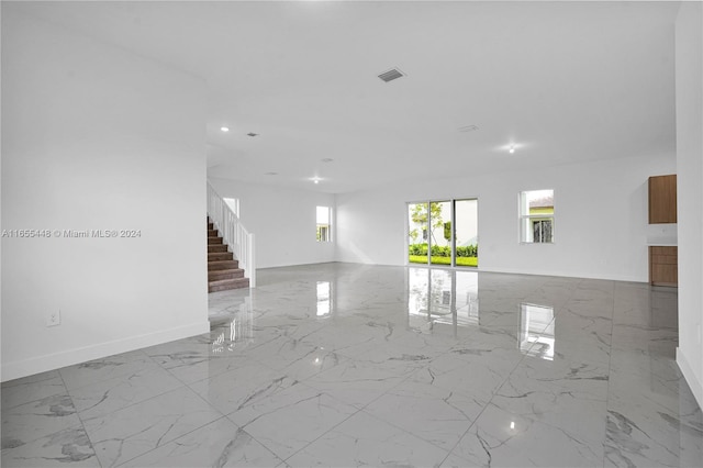 12267 SW 43rd Ct, Davie, FL 33330 - unfurnished room featuring marble tiled floors, stairway, and recessed lighting