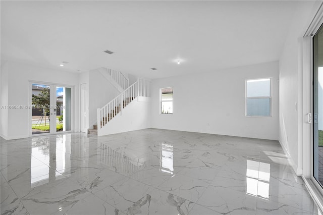 12267 SW 43rd Ct, Davie, FL 33330 - spare room featuring marble tiled flooring, stairway, and recessed lighting