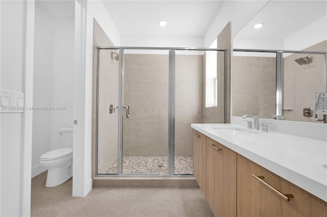12267 SW 43rd Ct, Davie, FL 33330 - full bathroom with double vanity, a stall shower, and recessed lighting