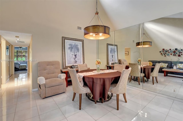 dining area featuring light tile patterned floors