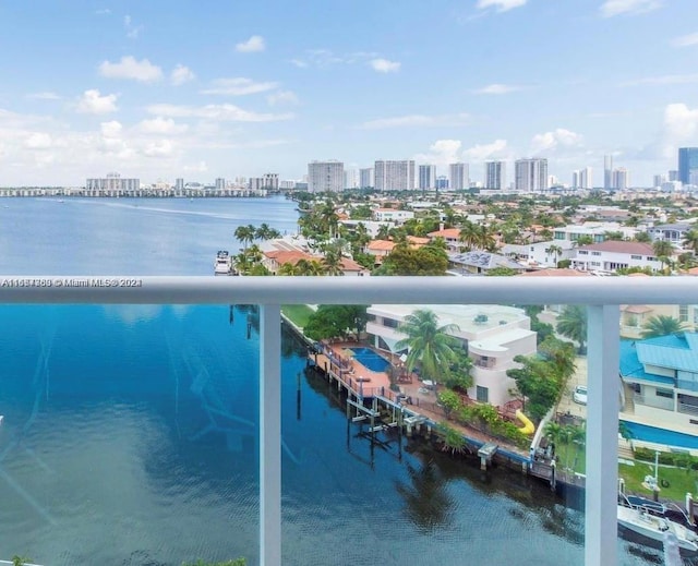 balcony featuring a water view and a view of city