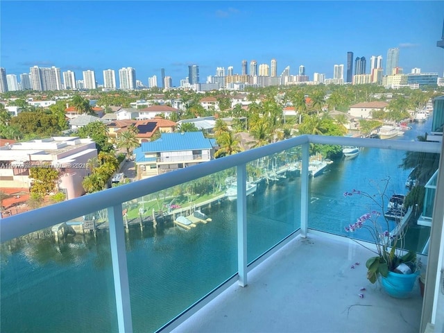 balcony with a city view and a water view