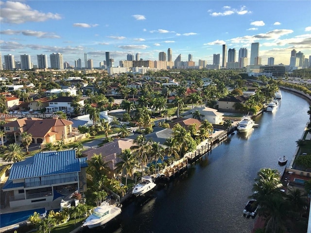 aerial view with a water view and a view of city