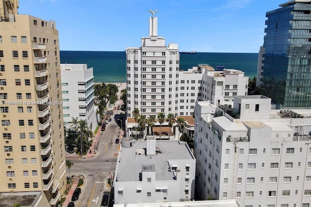 property's view of city with a water view