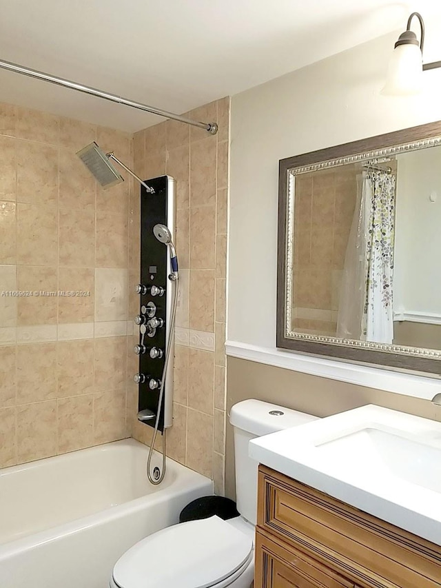 full bathroom with vanity, toilet, and shower / bath combo with shower curtain