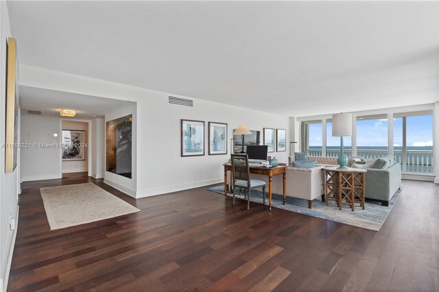 living room with dark wood-type flooring