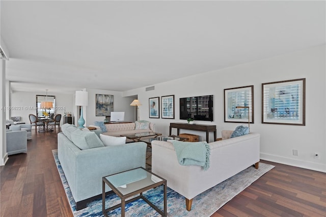 2200 S Ocean Ln Unit 702, Fort Lauderdale, FL 33316 - living area featuring dark wood-style floors, visible vents, a chandelier, and baseboards