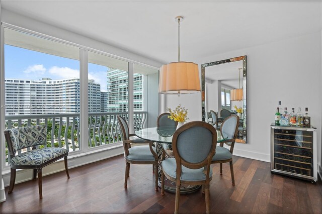 dining area with a healthy amount of sunlight, wine cooler, and dark wood-type flooring