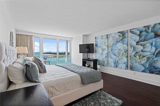2200 S Ocean Ln Unit 702, Fort Lauderdale, FL 33316 - bedroom featuring access to exterior, wood finished floors, and baseboards
