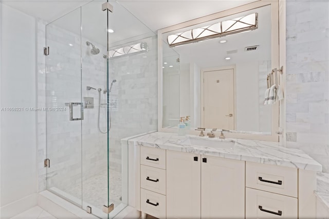 2200 S Ocean Ln Unit 702, Fort Lauderdale, FL 33316 - bathroom with vanity, a shower stall, and visible vents