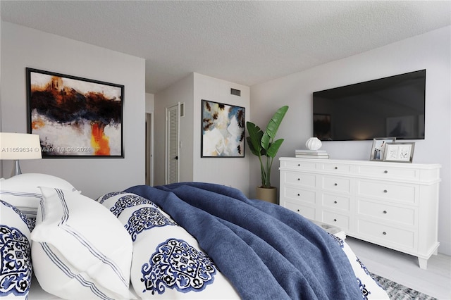 bedroom with a textured ceiling