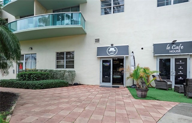 property entrance with a balcony