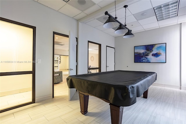 recreation room featuring billiards and a drop ceiling