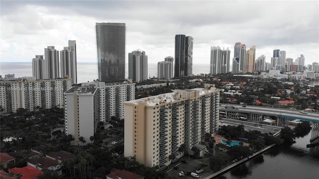 property's view of city with a water view