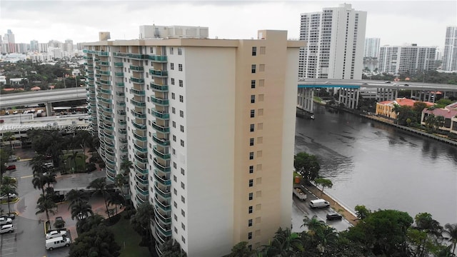 view of building exterior with a water view