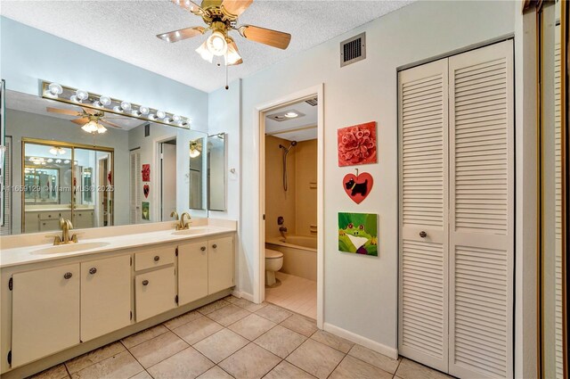 bathroom featuring vanity, a shower with curtain, and toilet