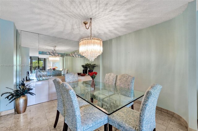 dining room featuring an inviting chandelier