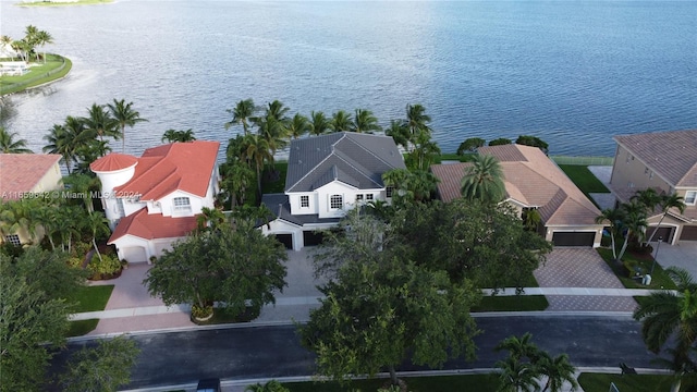 birds eye view of property featuring a water view