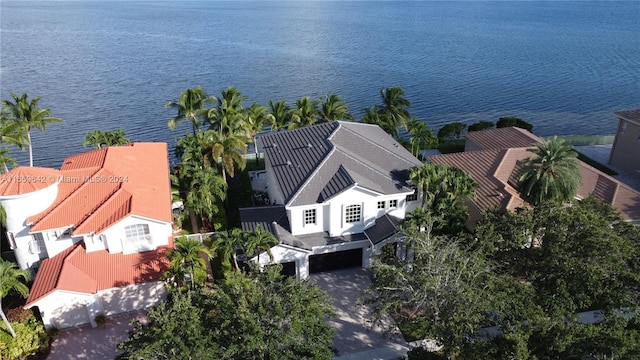 drone / aerial view with a water view