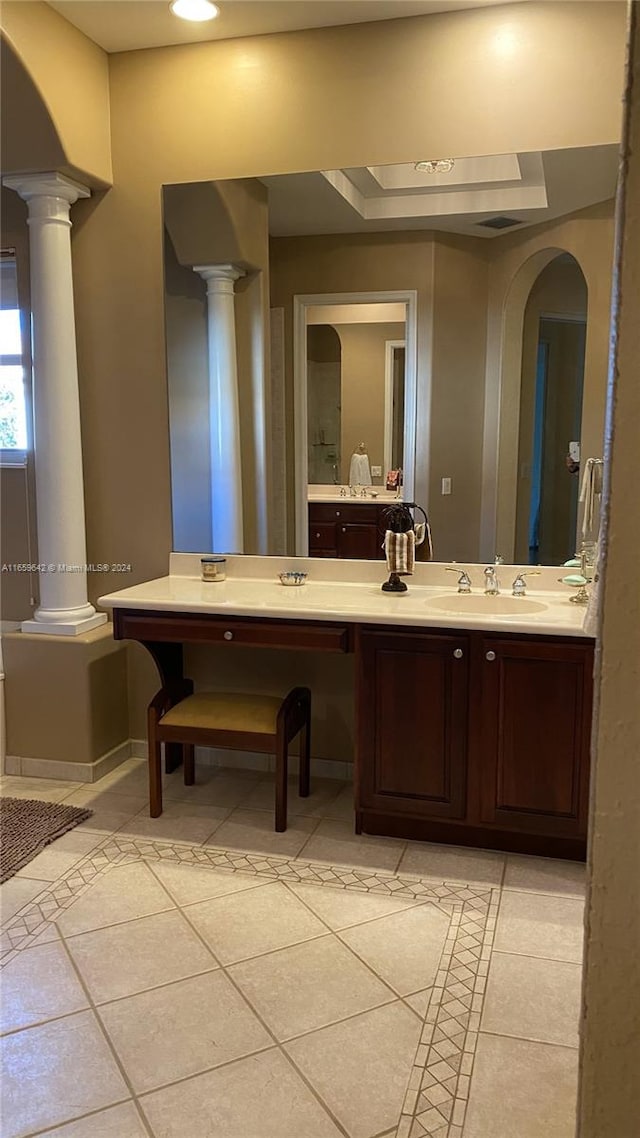 bathroom featuring vanity, decorative columns, and tile patterned flooring