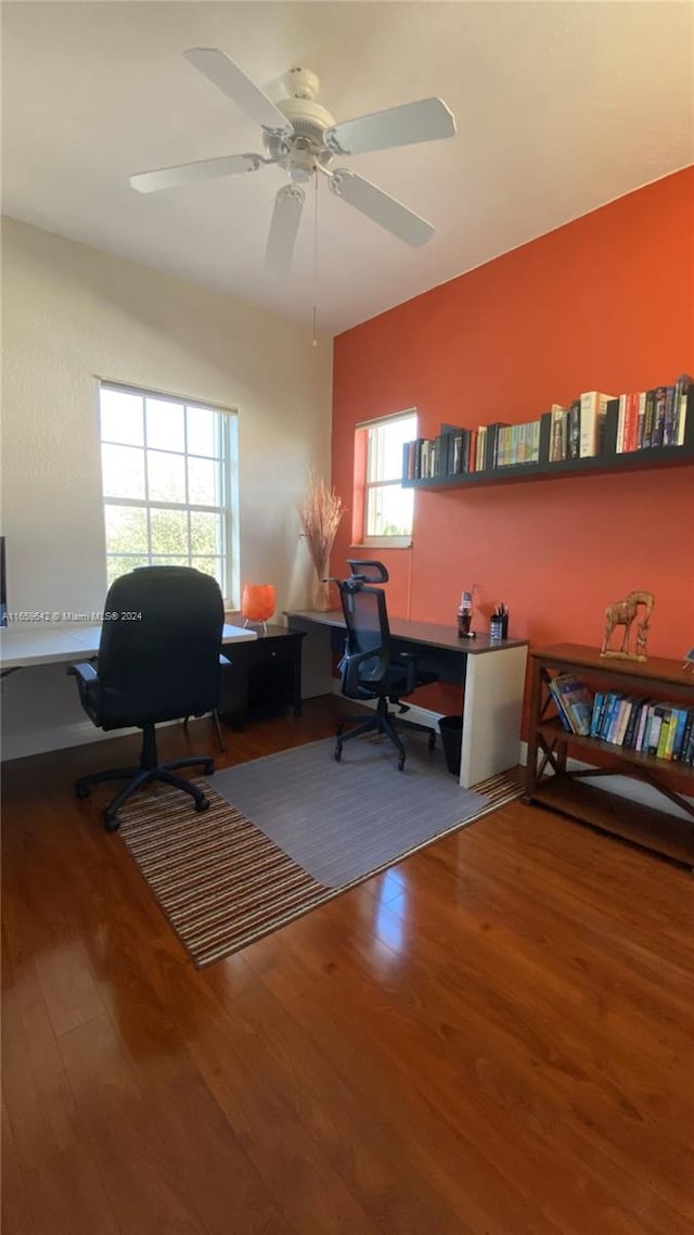 office with hardwood / wood-style flooring, ceiling fan, and a wealth of natural light