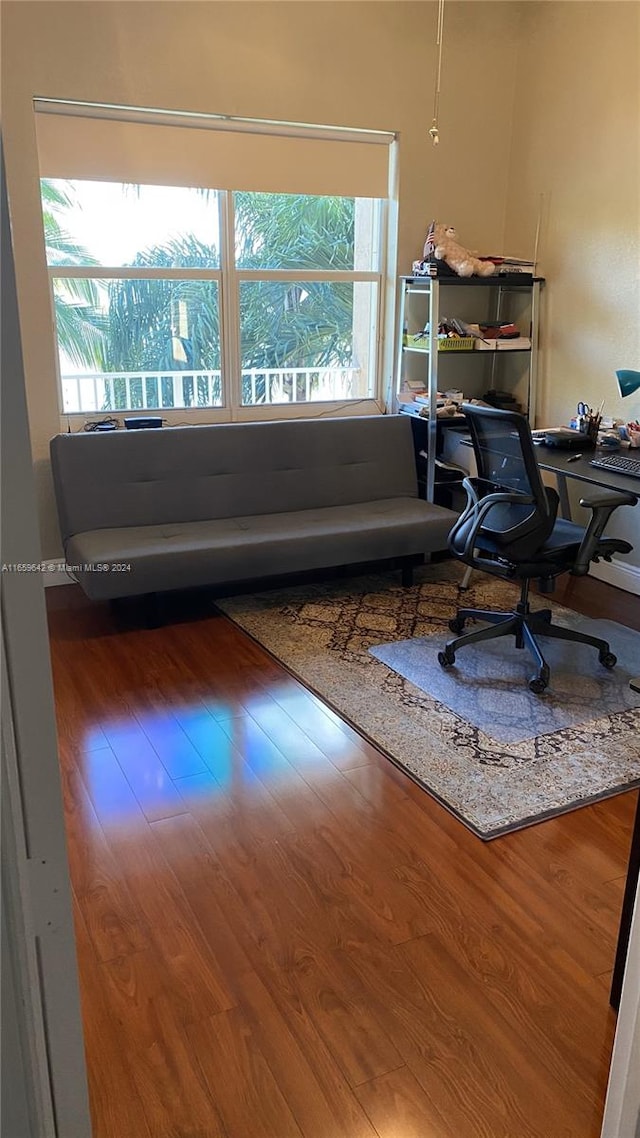 office area with wood-type flooring