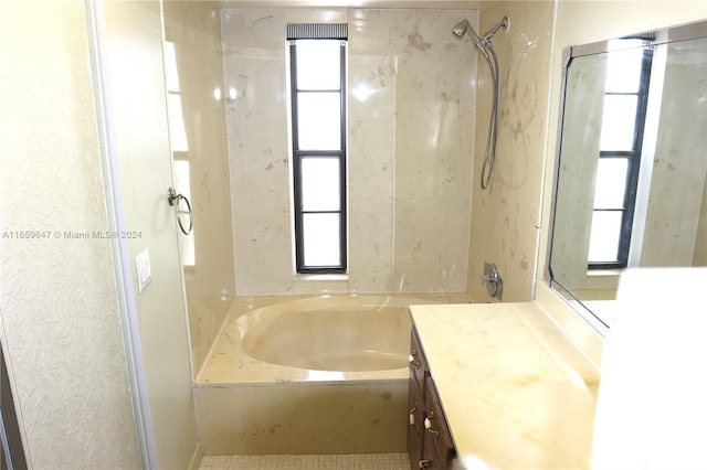 bathroom with shower with separate bathtub and vanity