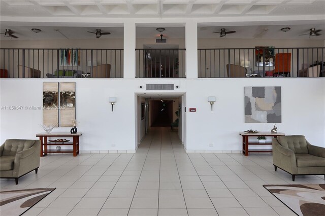 interior space featuring light colored carpet and a notable chandelier