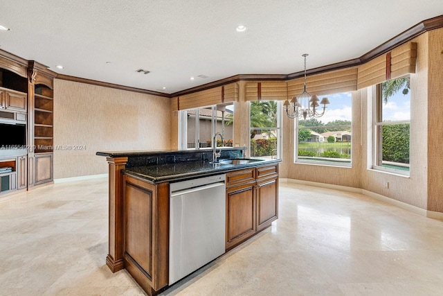 kitchen featuring a healthy amount of sunlight, a center island with sink, an inviting chandelier, sink, and stainless steel dishwasher