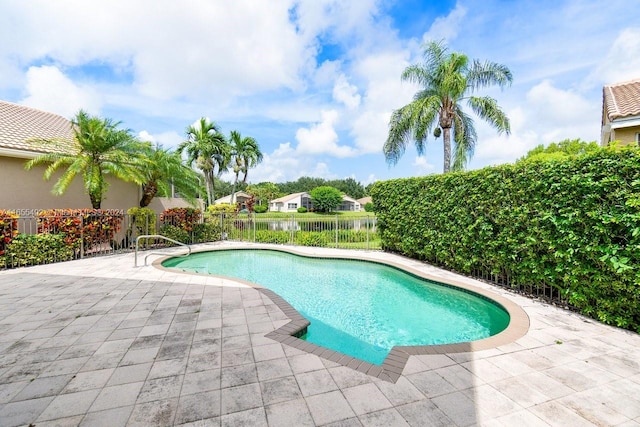 view of pool featuring a patio